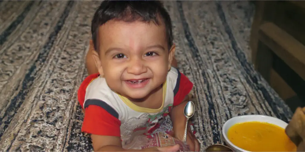 My little brother running behind the mongoose